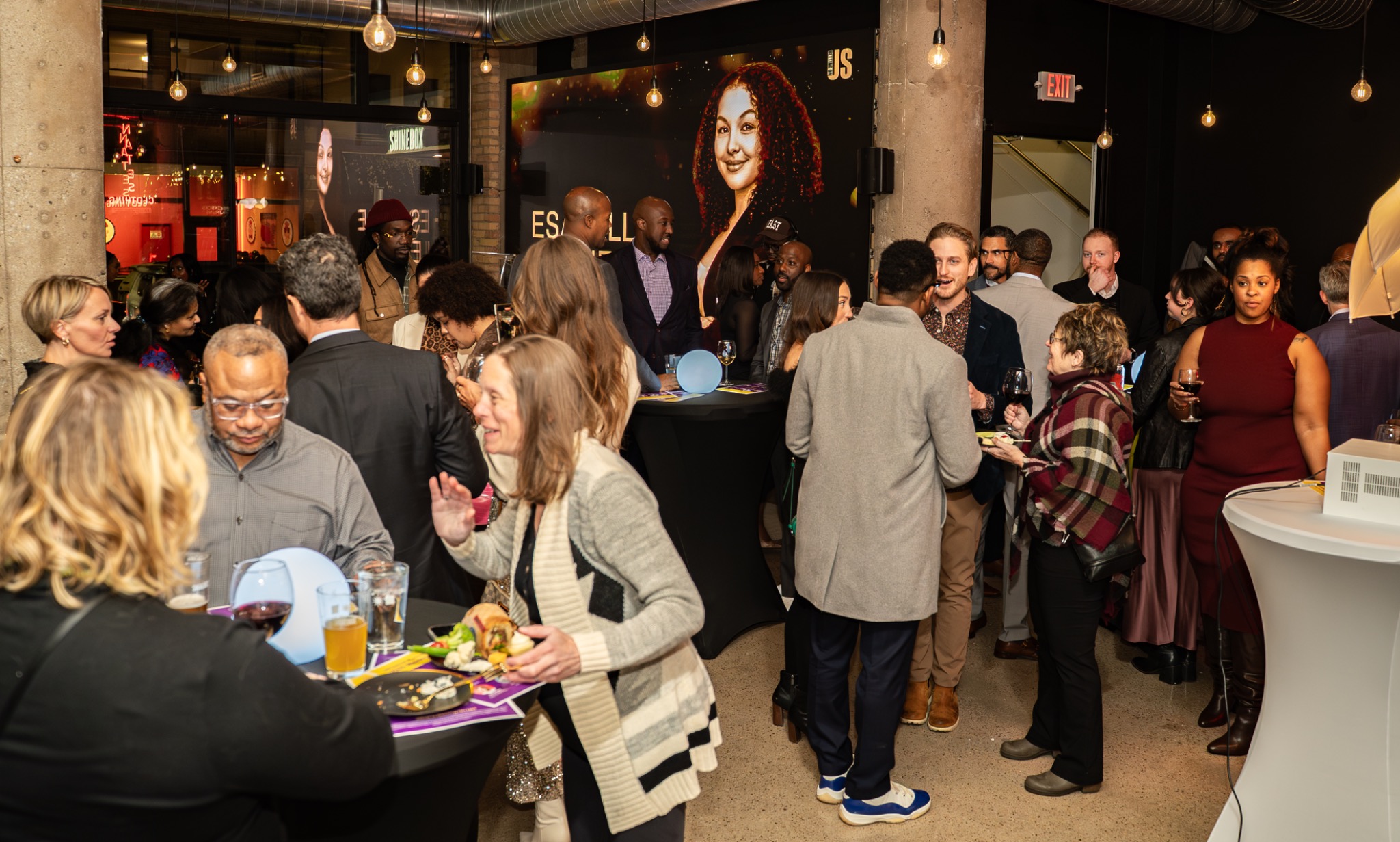 Guests in conversation at the Mavericks and Mavens reception